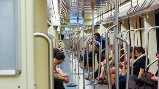 Passengers inside a Santiago Metro carriage, where the bip card Santiago system is used