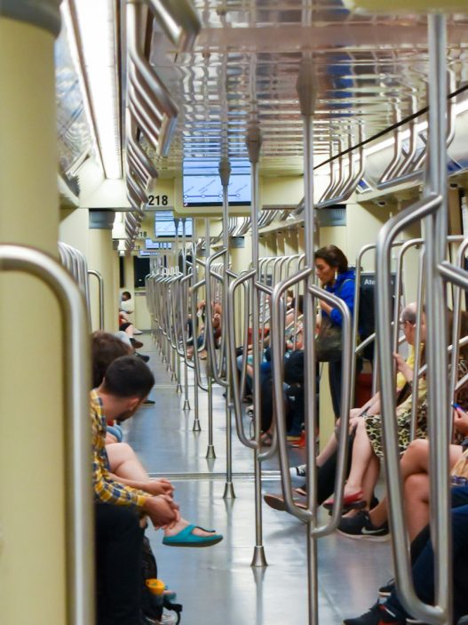 Passengers inside a Santiago Metro carriage, where the bip card Santiago system is used