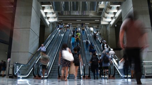Passengers on the escalators of a Santiago Metro station in Chile