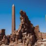 Egyptian obelisks at the Karnak temple complex in Luxor under a clear blue sky